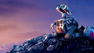 WALL-E standing on a pile of garbage. Image: Walt Disney Studios Motion Pictures via variety.com